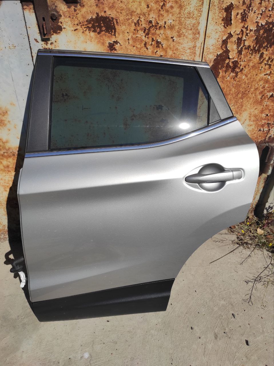 Двері задні ліві Nissan Qashqai J11 / Rogue Sport 2014-2022 82101-4EA0A