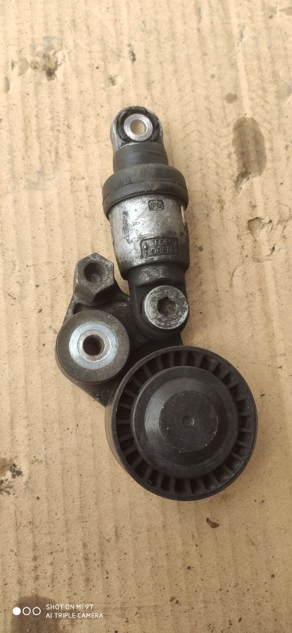 Натягувач ременя Mazda 3 BM / BN P51D-15-980