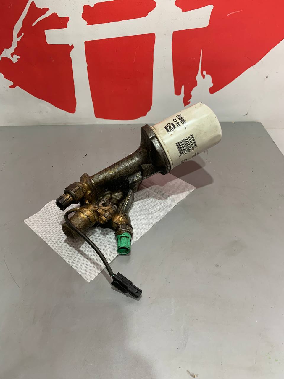 Корпус масляного фільтра Acura MDX 2 покоління 15810-RYE-A01